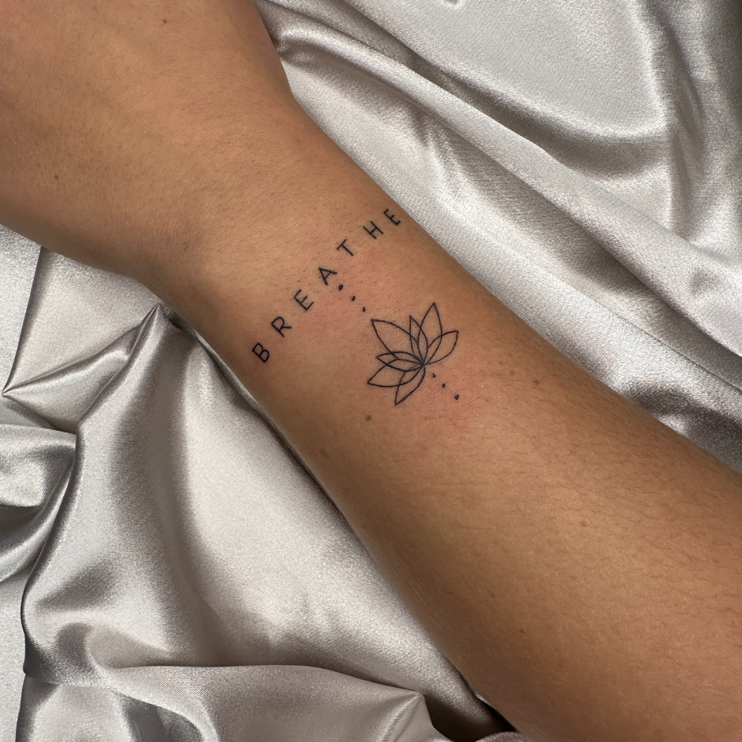 Fine line tattoo Brabham featuring detailed and minimalist designs crafted by skilled tattoo artists.